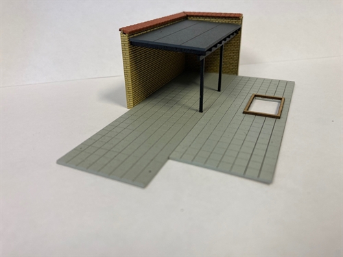 Hobbytrade 87294 Carport mit gelber Steinauffahrt. H0
